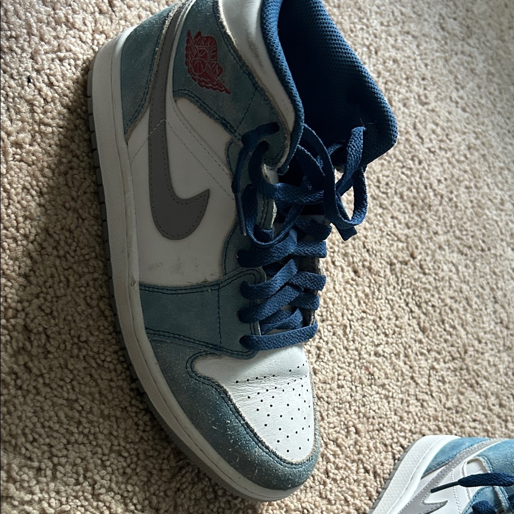 Blue and White High-Top Jordan Sneakers